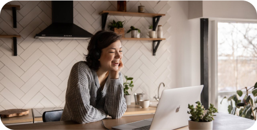 woman smiling during a virtual interaction