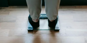 close up of person standing on a scale