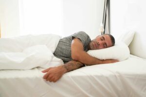 man with wegovy fatigue sleeping in bed