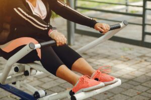 Photo of woman on exercise machine